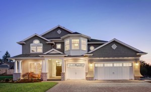 New rolling overhead garage doors installed on a residential home in Guelph, Ontario