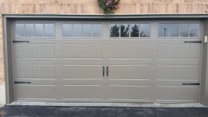 Bronze Clopay Gallery long panel door with arch-3 rectangular grille and standard hardware