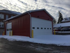 Clopay 3720 white commercial overhead garage door installed by WM Haws