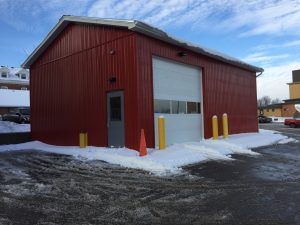 Clopay 3720 white commercial overhead door with full vision window panels