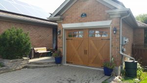 Clopay Canyon Ridge 5-layer door with mahogany cladding, design 21, available through WM Haws