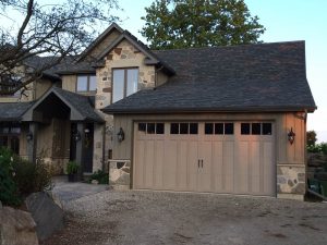 Sandtone Clopay Coachman carriage-house door variant 2, WM Haws Overhead Doors