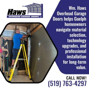 Technician installing an overhead garage door inside a residential garage for a Guelph homeowner.