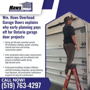 Technician planning and measuring overhead garage door installation.