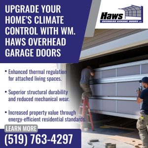 Technicians installing an insulated garage door to improve home energy efficiency and temperature control